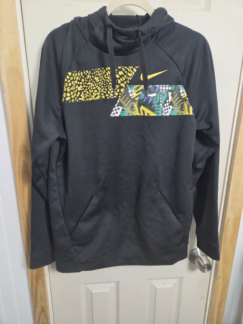 Vintage Nike Black Hoodie with Yellow and Multicolor Chest Swoosh Graphic